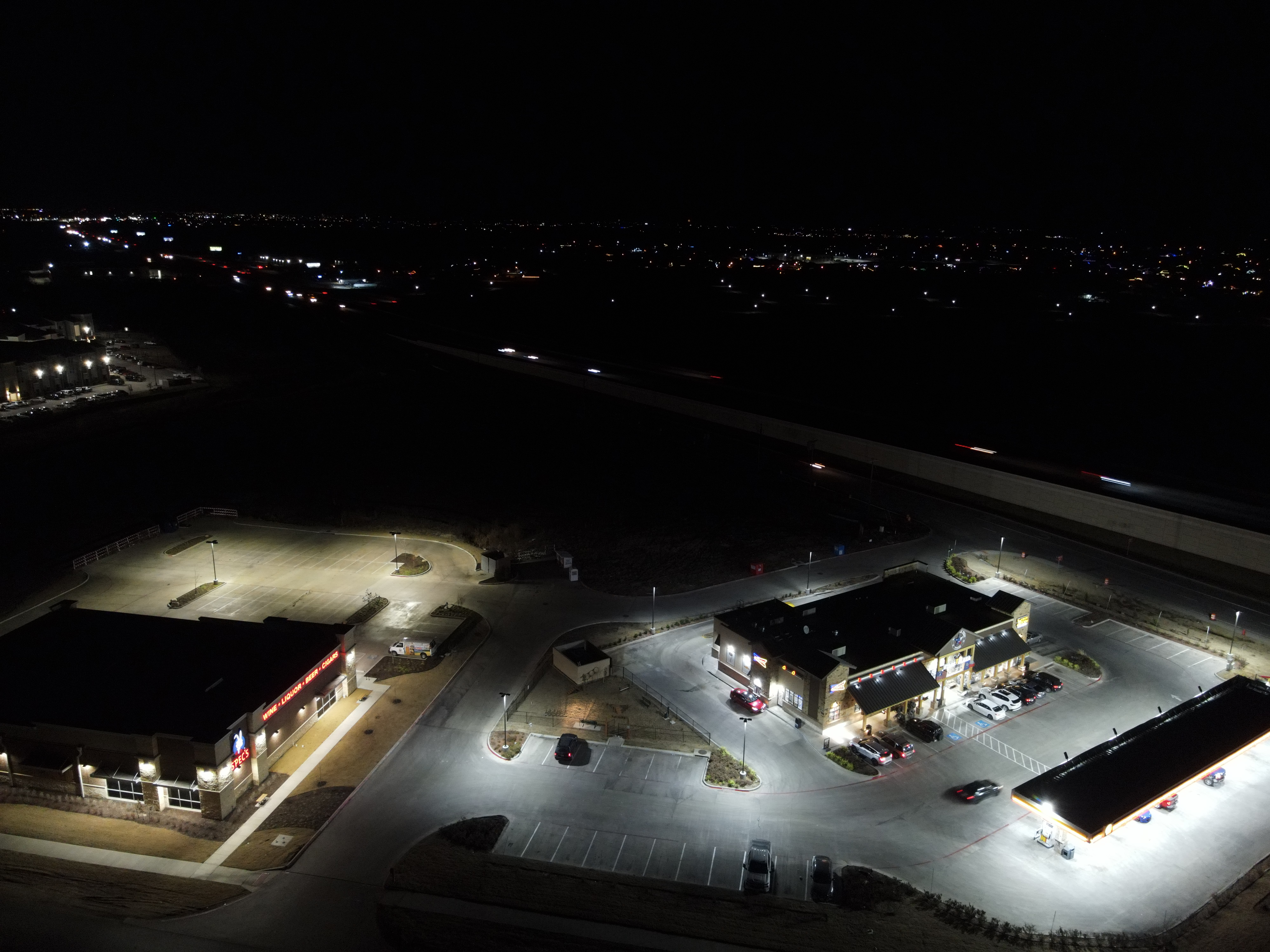 Aerial Photography of a gas station at night